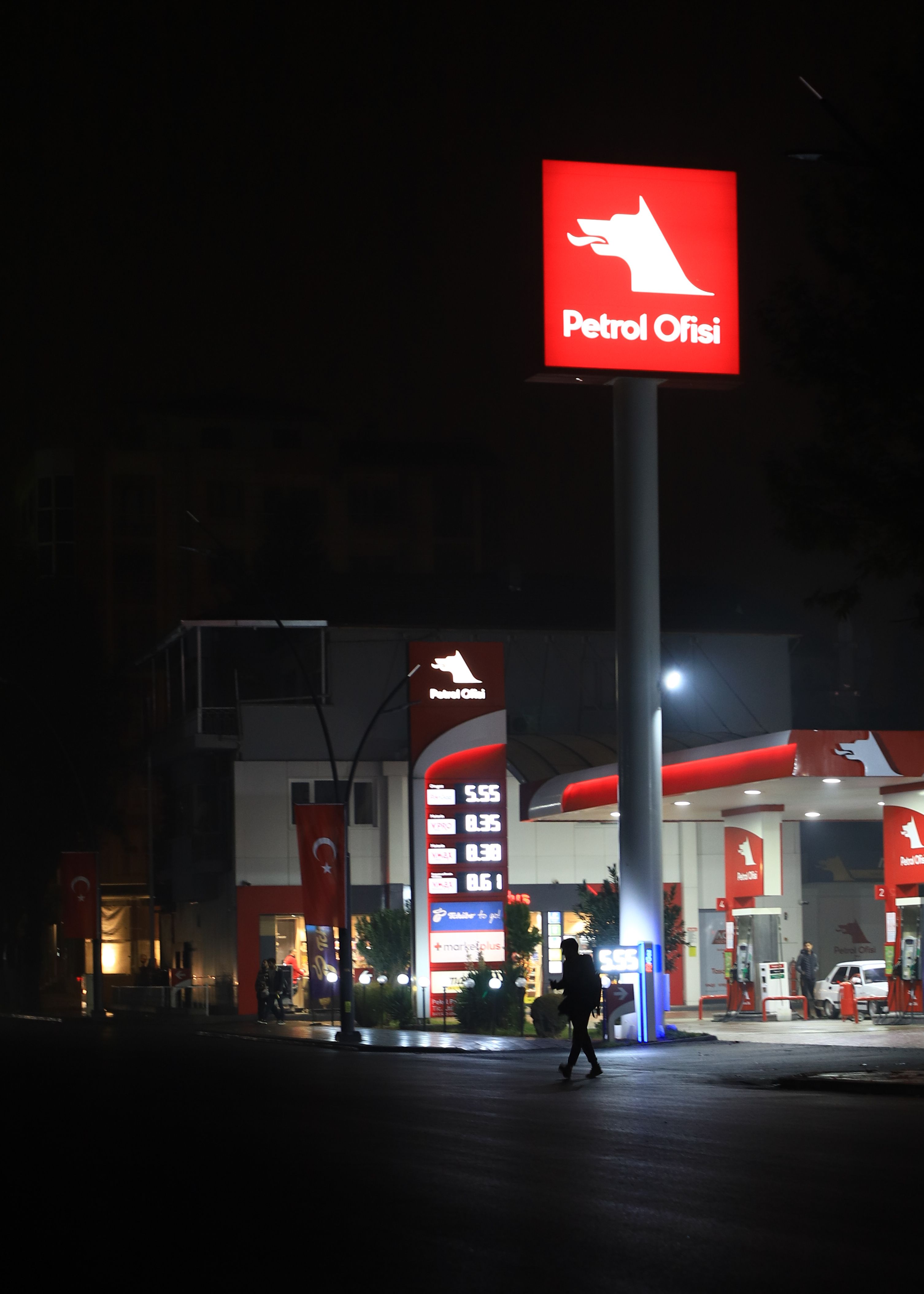 Gas station price sign showing fuel costs