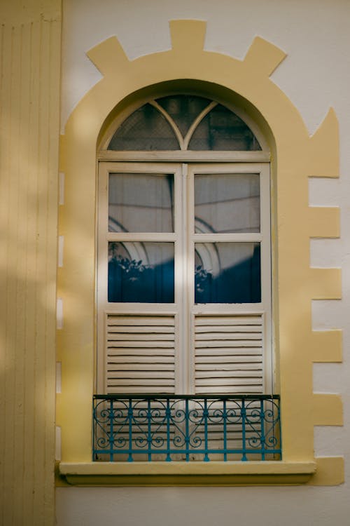 Arched Window with Metal Railing · Free Stock Photo