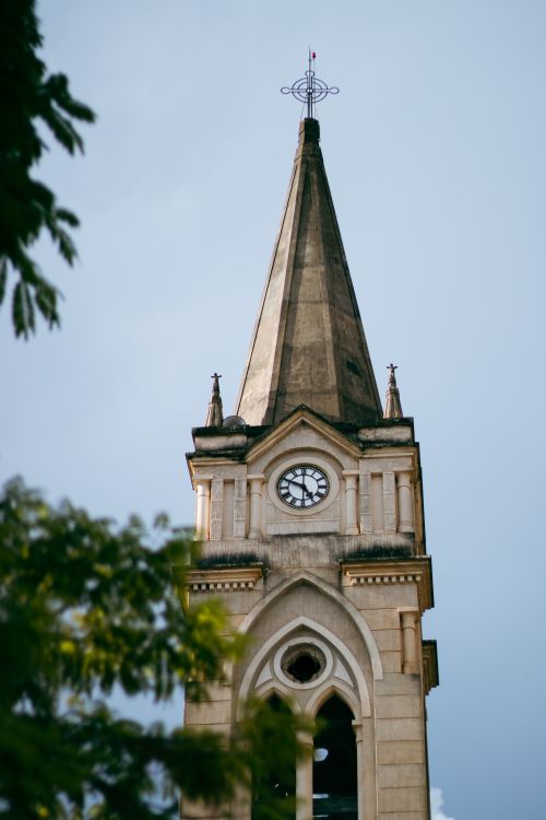 Free Close-up of a historic clock tower in Goiás, Brazil, featuring architectural details. Stock Photo