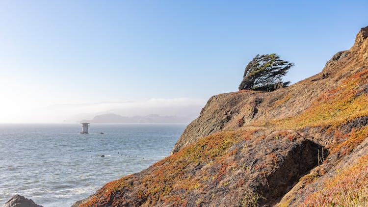 Scenic View Of The Mountains By The Sea