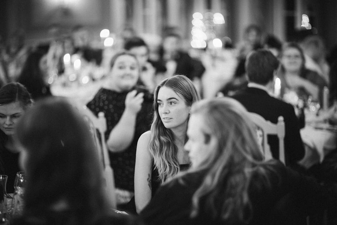 Grayscale Photo of a Beautiful Woman in a Crown