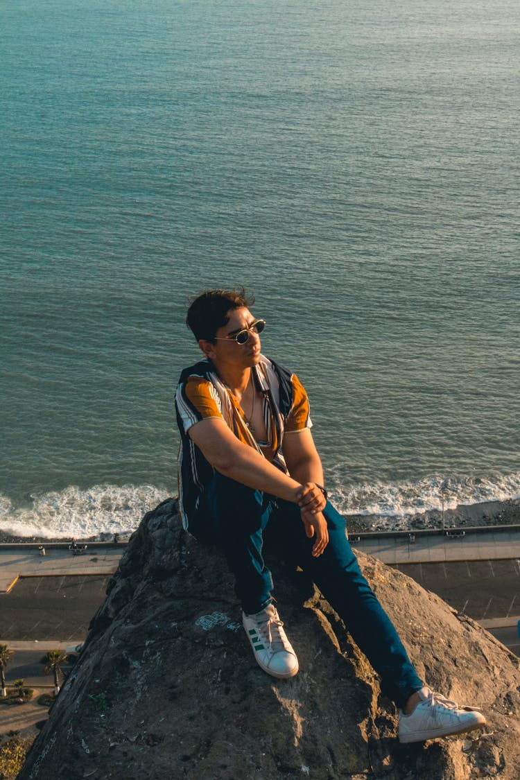 Man Relaxing On Beach