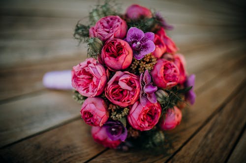 Close-up of Flowers Bouquet on Wooden Table