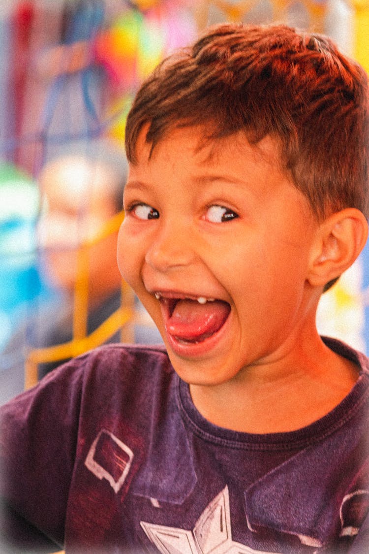 Cute Child Smiling Showing Toothless Mouth 