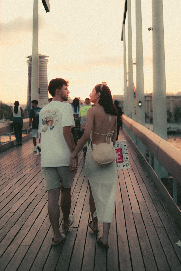 Woman And Man Walking Together