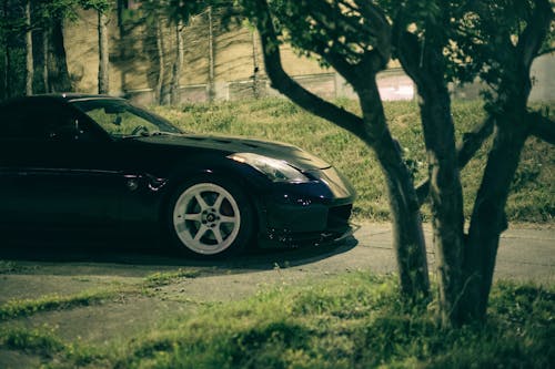 Photo of Black Car Parked on Pavement