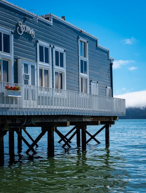 Wooden House Over the Body of Water 