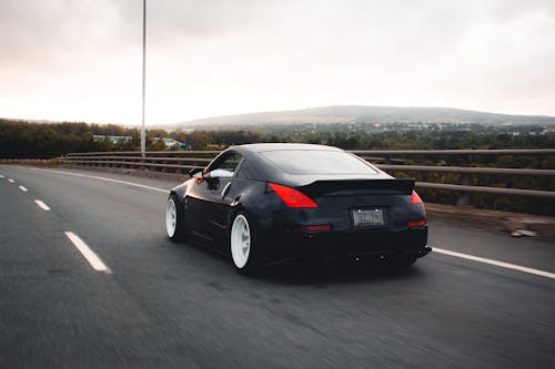 Free Black Car on Road Stock Photo