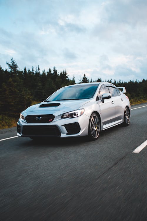 Free Silver Car on the Road Stock Photo