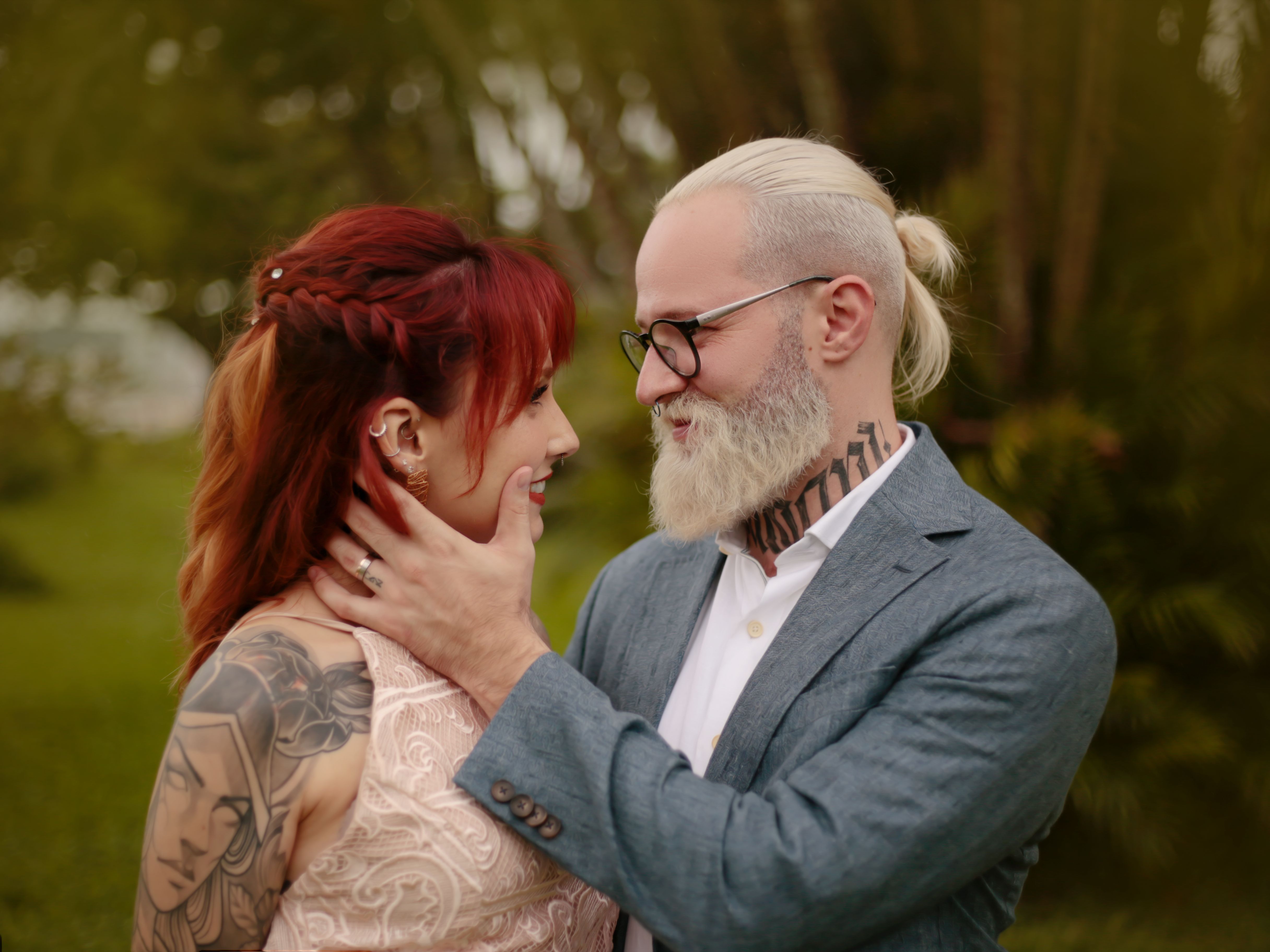 A loving couple embracing in a natural outdoor setting, highlighting romance and connection.