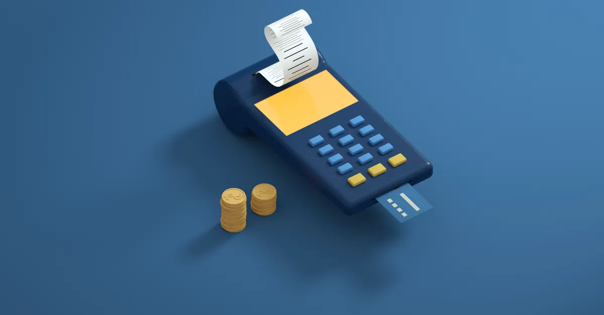 A payment terminal with a printed receipt and coins, representing goods and services tax at the point of sale