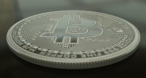 A Close-Up Shot of a Bitcoin Commemorative Coin