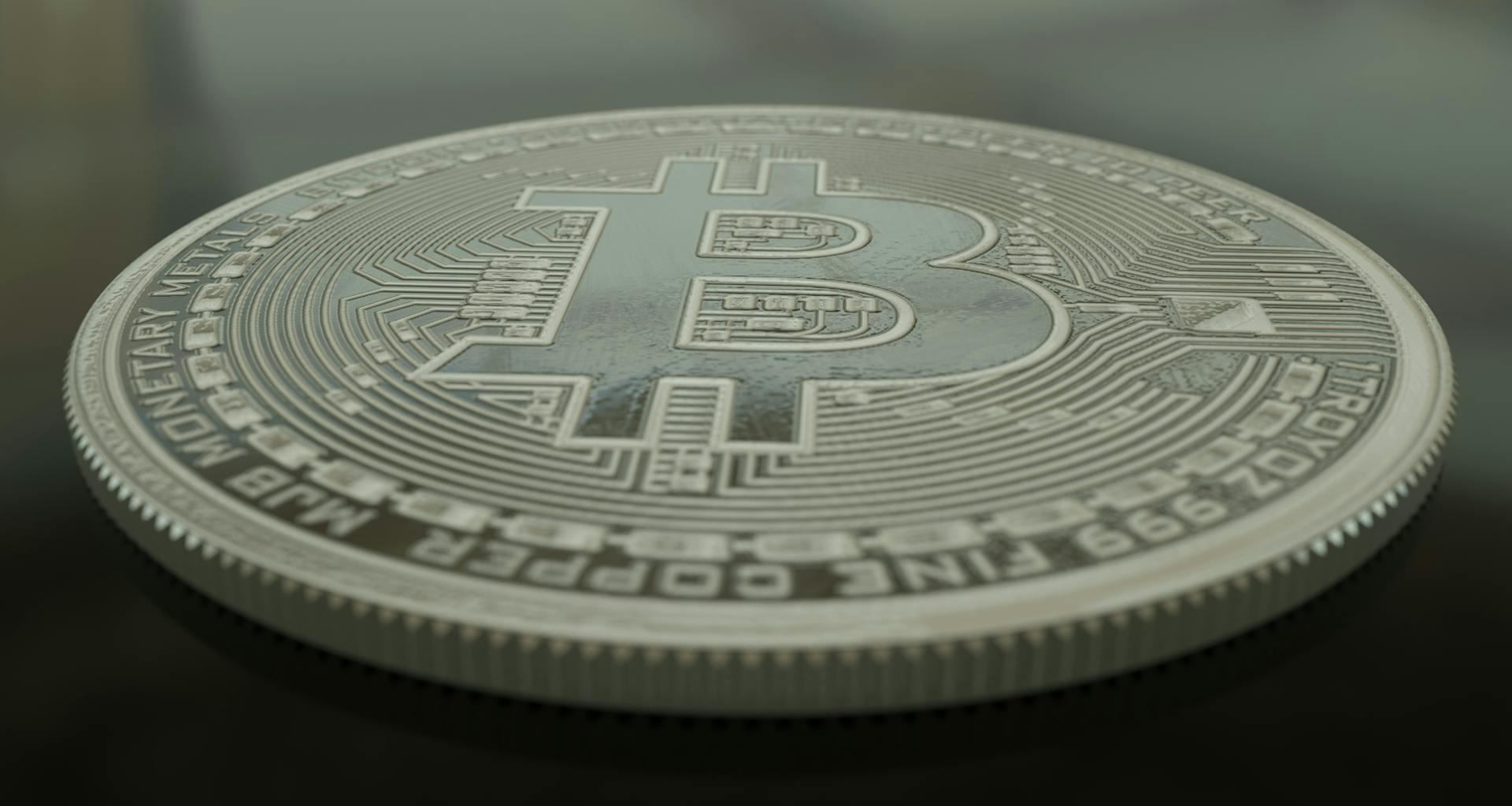 A Close-Up Shot of a Bitcoin Commemorative Coin