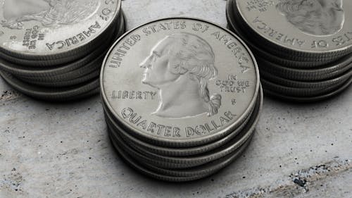 Close-Up Photo of Dollar Coins