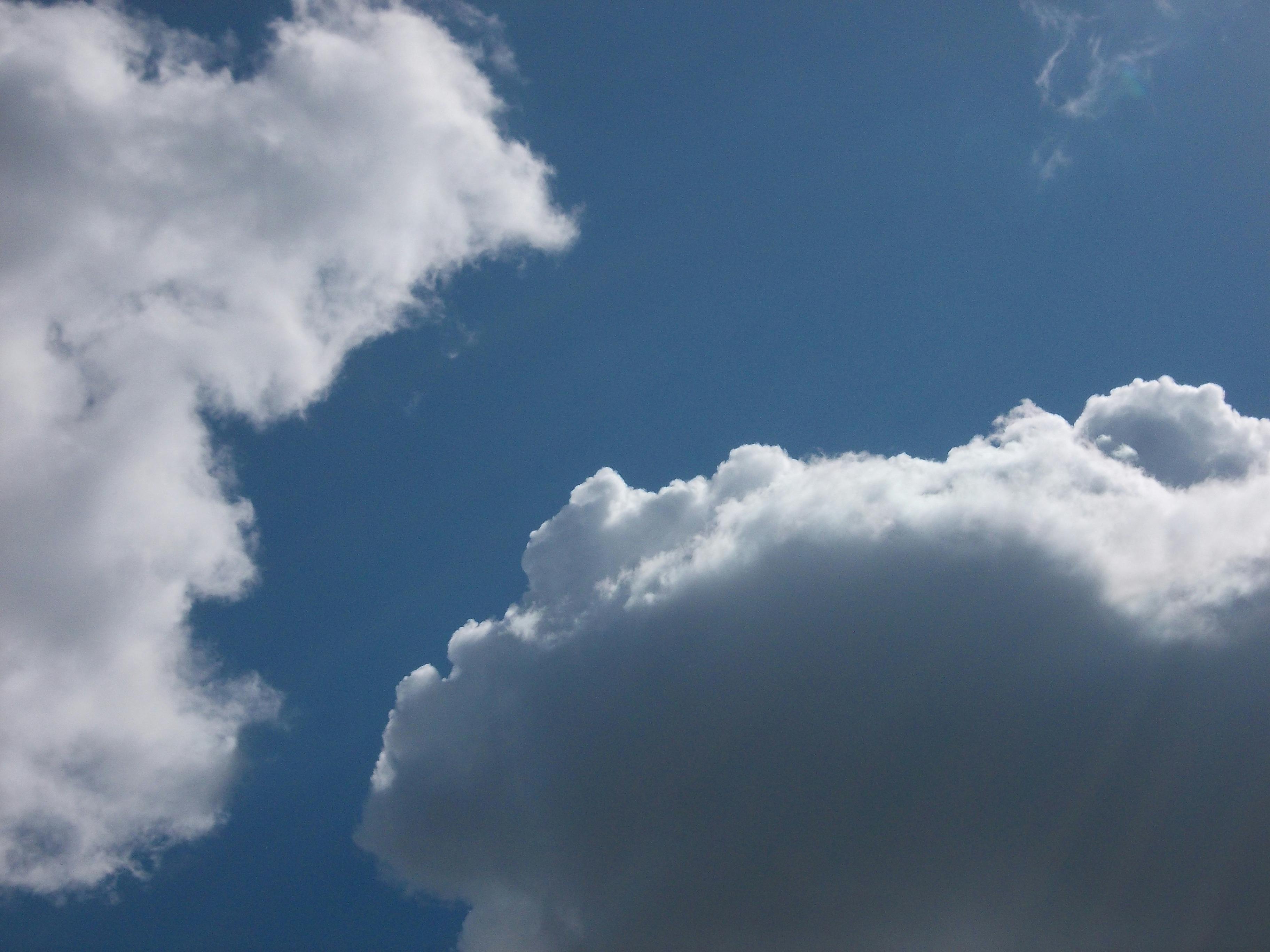 Laptop on a desk connected to devices via a USB-C hub