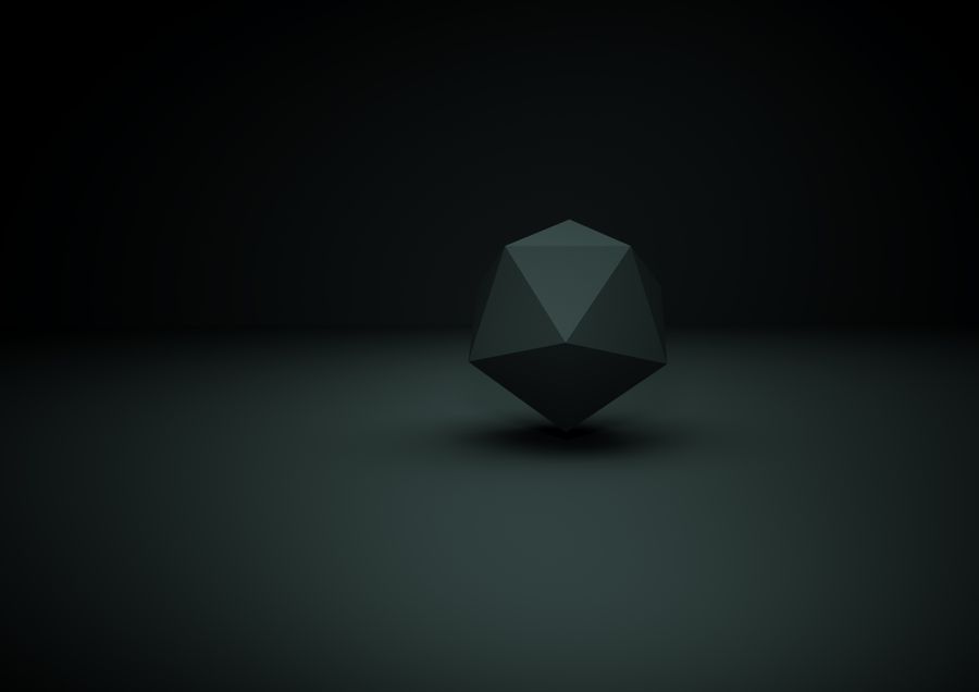 Dark polyhedron in a dim room — photo by crazy motions on Pexels
