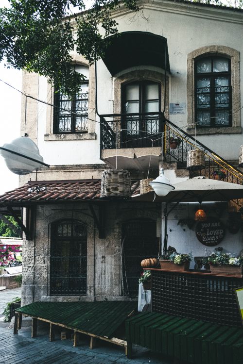 Free A rustic house with vintage decor showcasing classic architecture and cozy atmosphere. Stock Photo