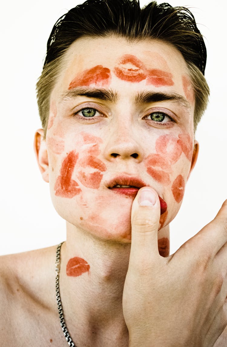 Man With Lipstick Marks On Face