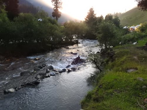 Бесплатное стоковое фото с закат, река, солнце