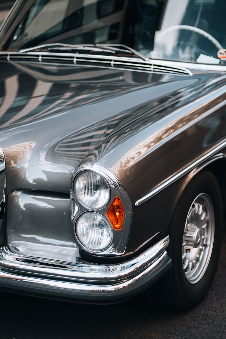 Grey Vintage Car With Chrome Bumpers