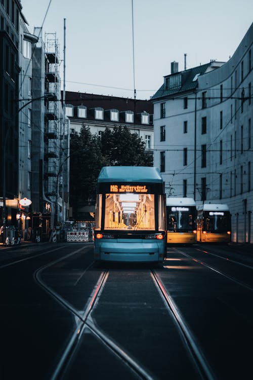 Free Blue and White Tram on Road Stock Photo
