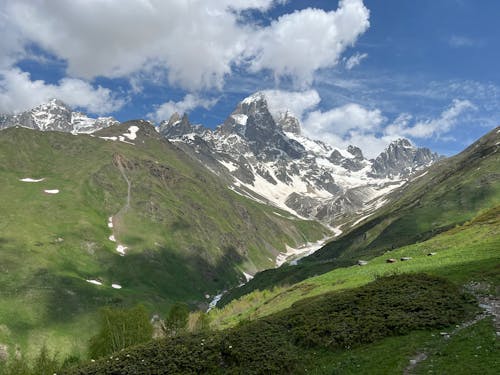 Aerial Photography of Mountains under the Cloudy Mountains