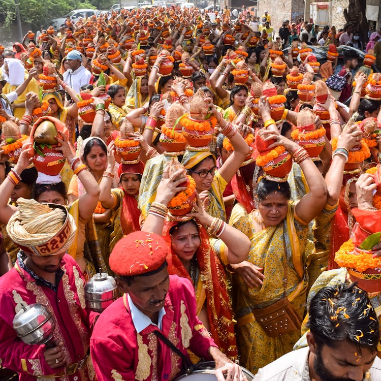 Women With Kalash On Heads Marching On Street