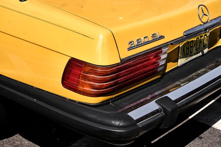 A Car Accessory On A Yellow Classic Car 