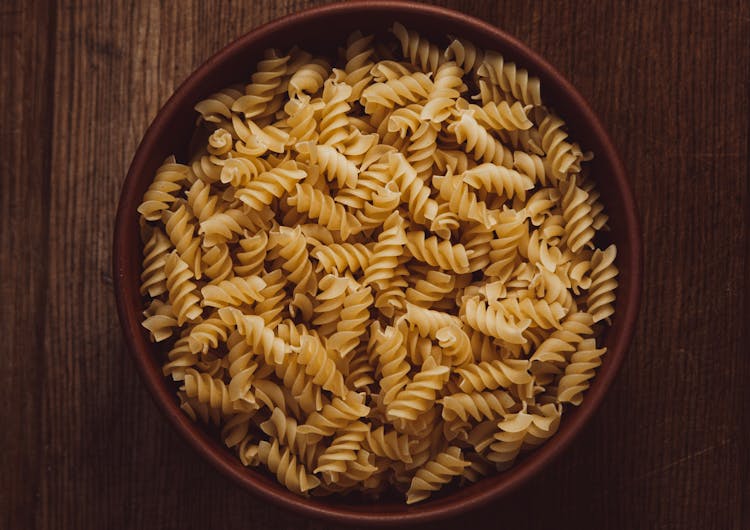 Close-Up Shot Of Rotini Pasta In A Bowl