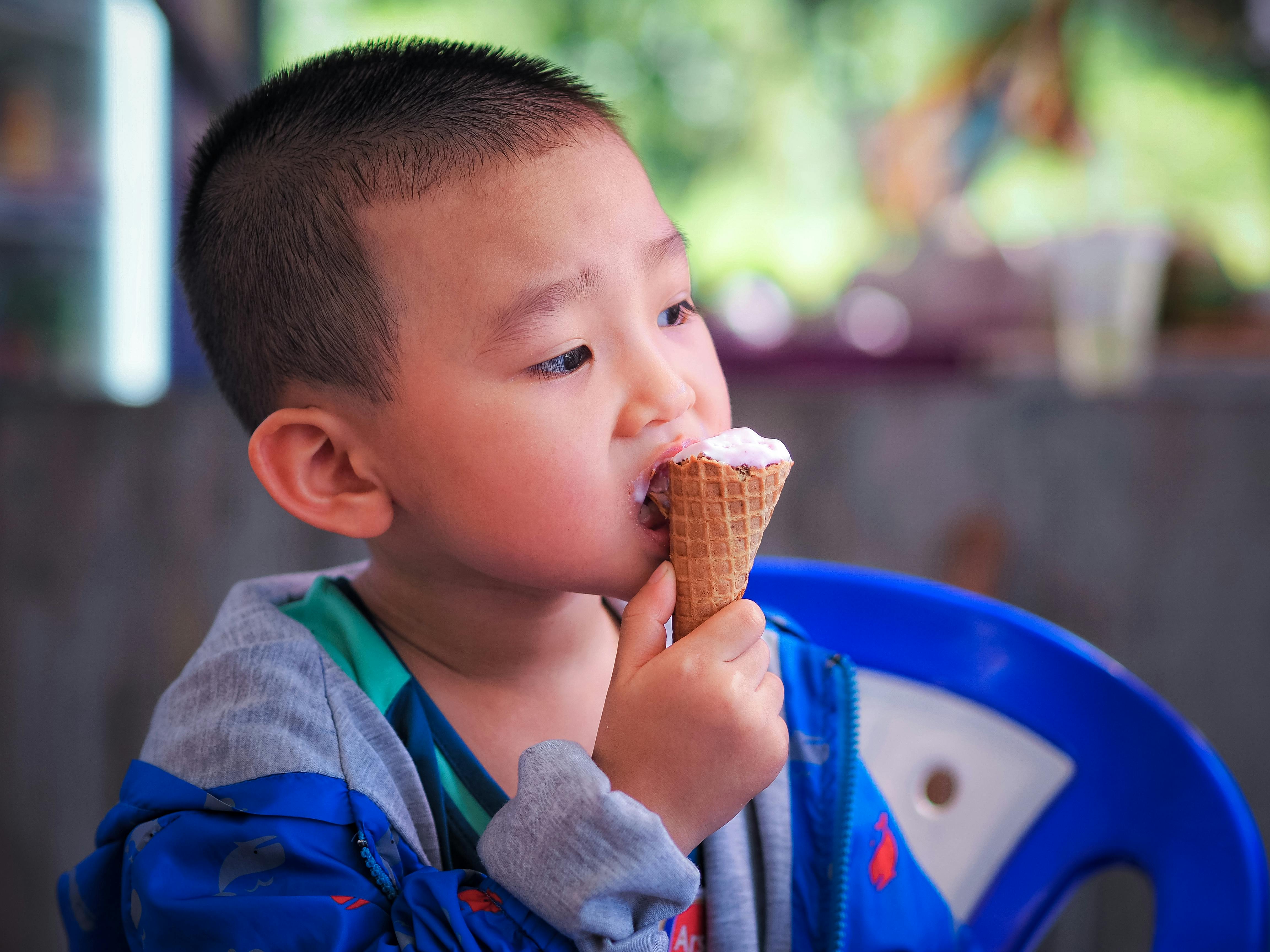 Woman Eating an Ice Cream · Free Stock Photo