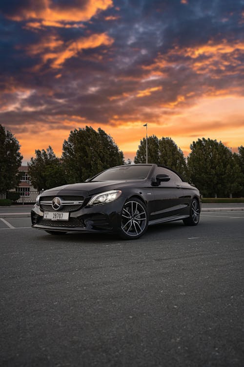 Black Mercedes-Benz Classe C Coupe Car Parked on Road During Sunset
