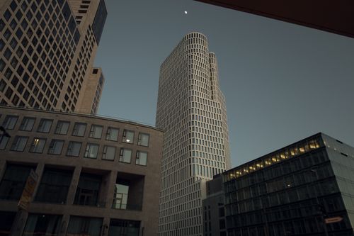 Free Captivating cityscape showing tall skyscrapers against the dusk sky, highlighting urban architecture. Stock Photo