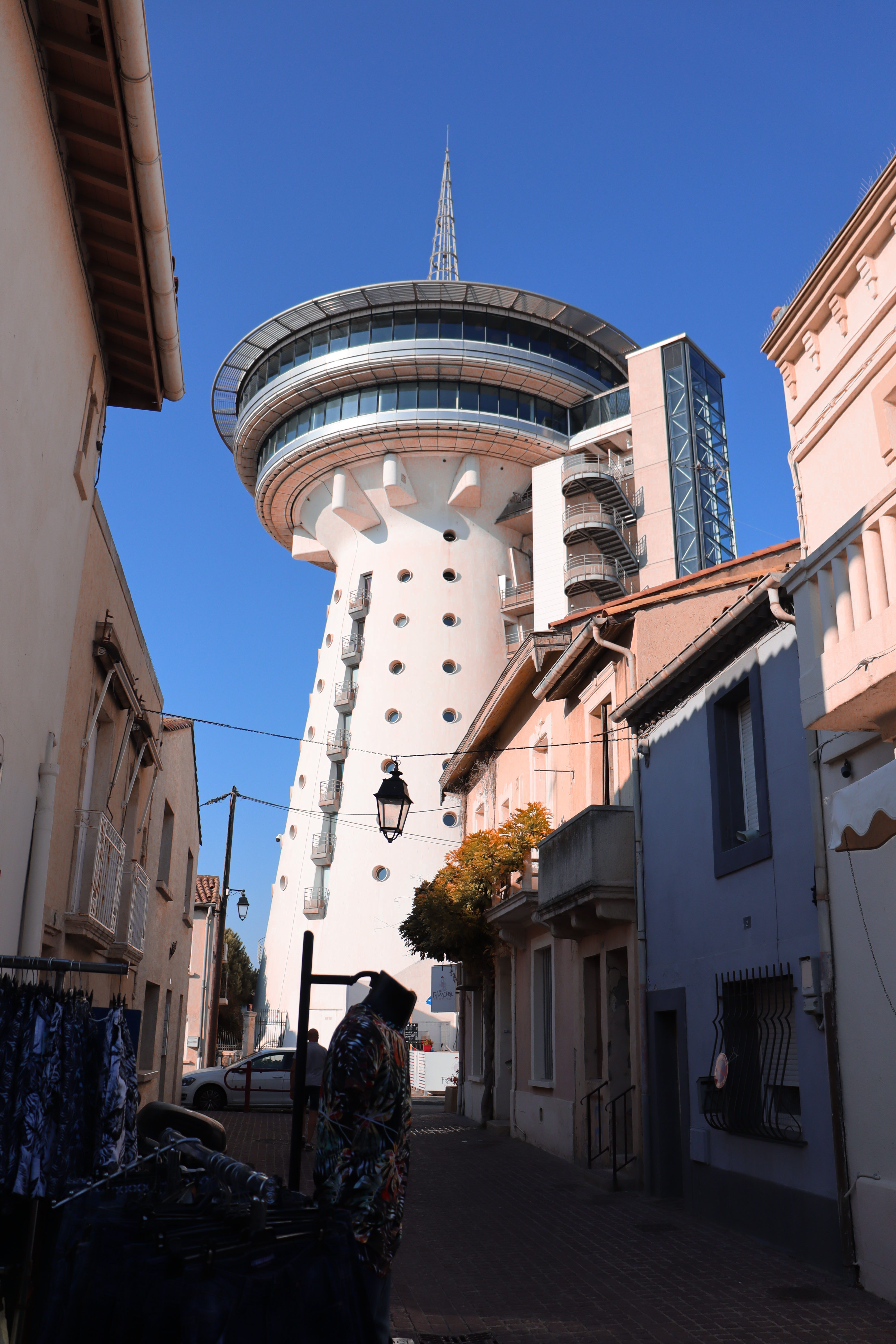 A Low Angle Shot of a Tower Under the Blue Sky · Free Stock Photo