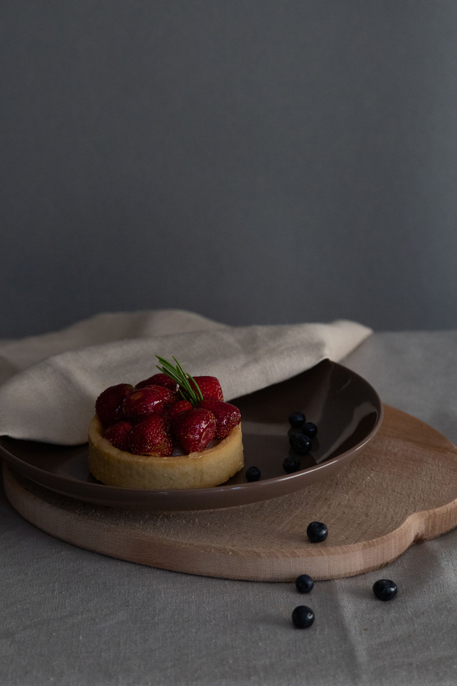 Tart plated with fresh berries