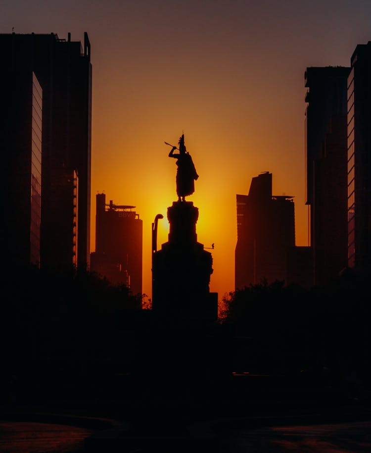 Silhouette Of A Statue In A City At Sunset, Mexico City, Mexico