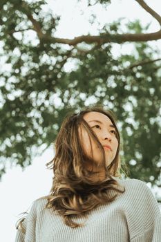 Portrait of a Woman Under a Tree
