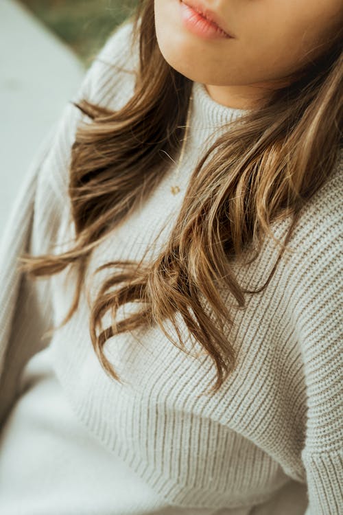Free A Woman in White Knitted Sweater Stock Photo