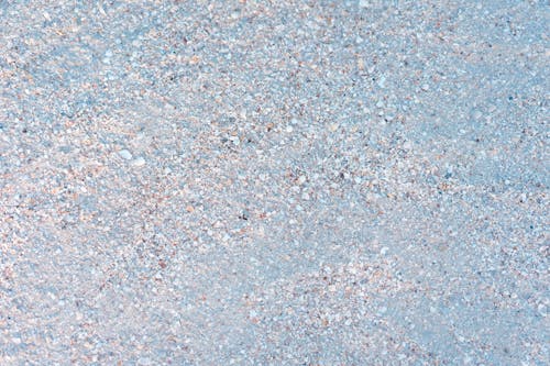 Stones and Pebbles on Sand