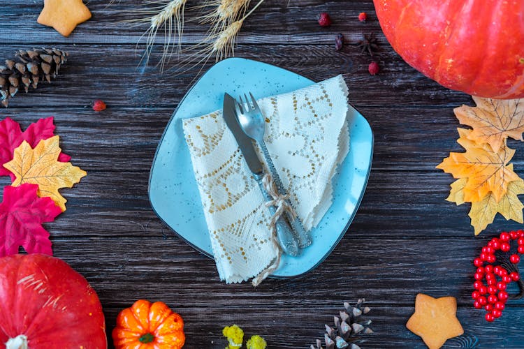 Cutlery And A Napkin On A Plate