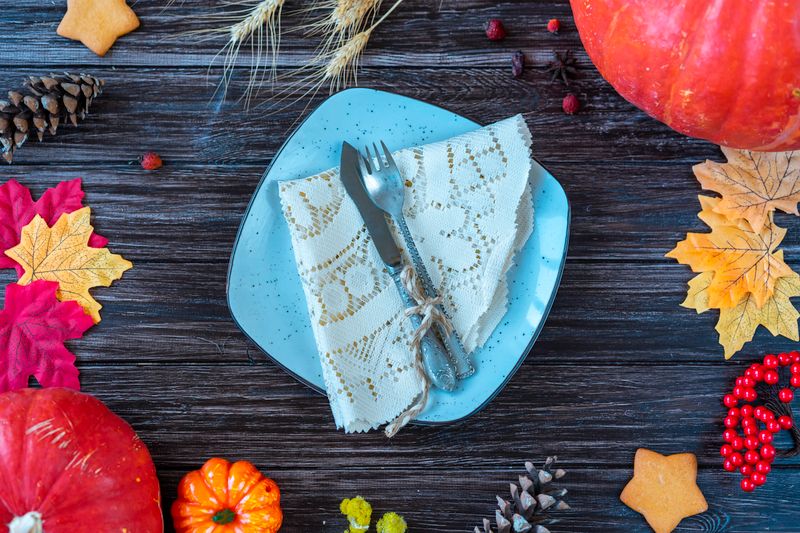 Halloween party table set with themed plates and napkins