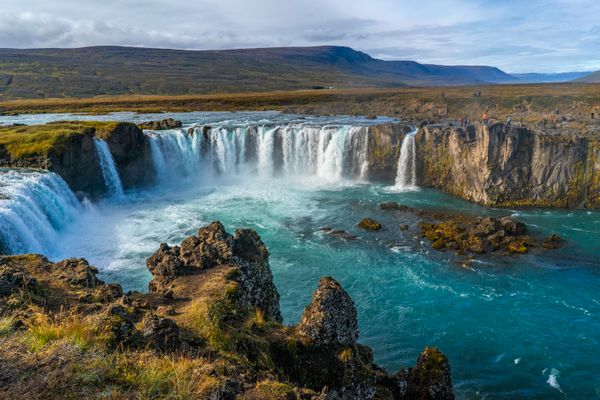 Wide basalt waterfall on a highland river — photo by Atlantic Ambience on Pexels