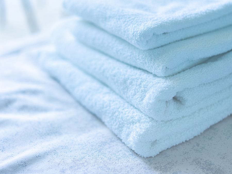 Stack of folded white cotton towels