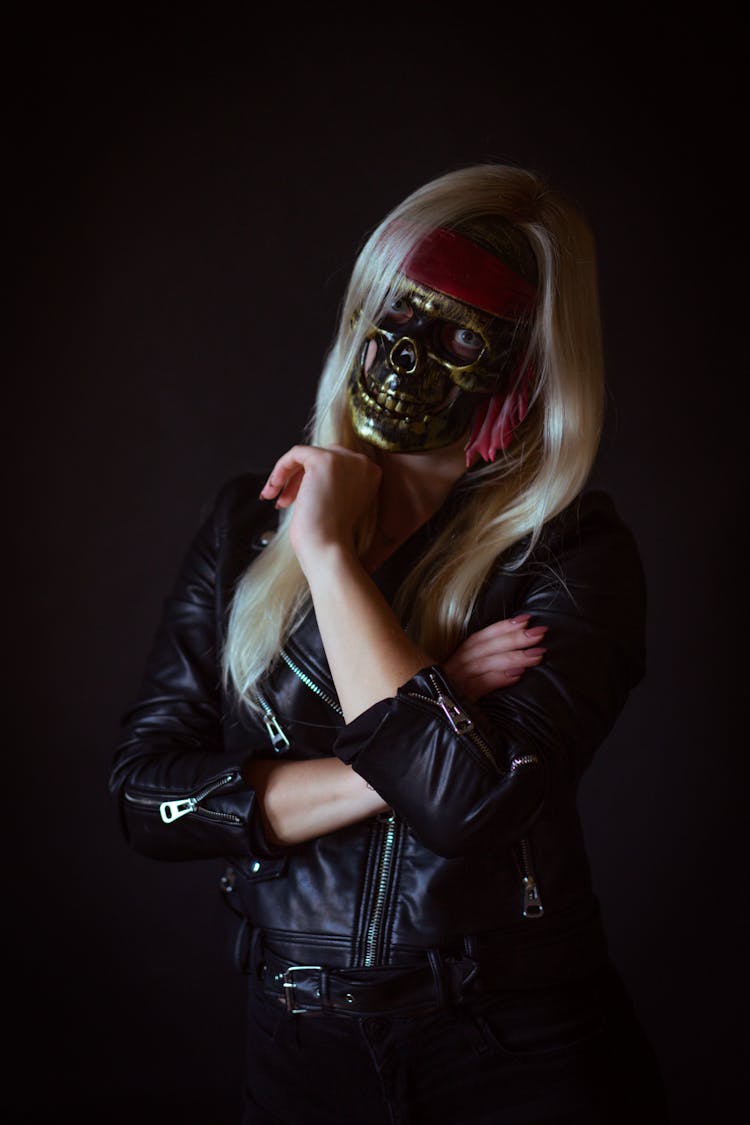 A Woman Wearing A Skull Mask