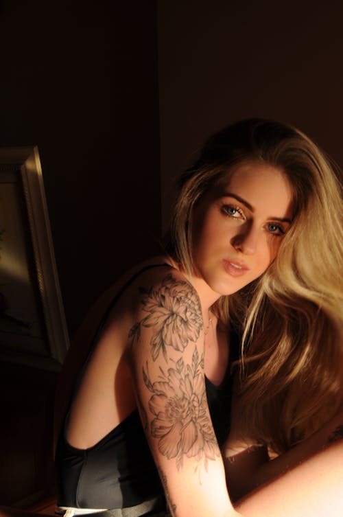 Beautiful Woman with Arm Tattoo