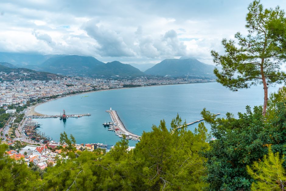 Photo: Atlantic Ambience / Pexels Aerial view of the Alanya coastline, harbour and mountains in Turkey