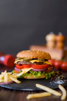 Indulge in a mouthwatering cheeseburger with fresh fries, perfect for food enthusiasts.