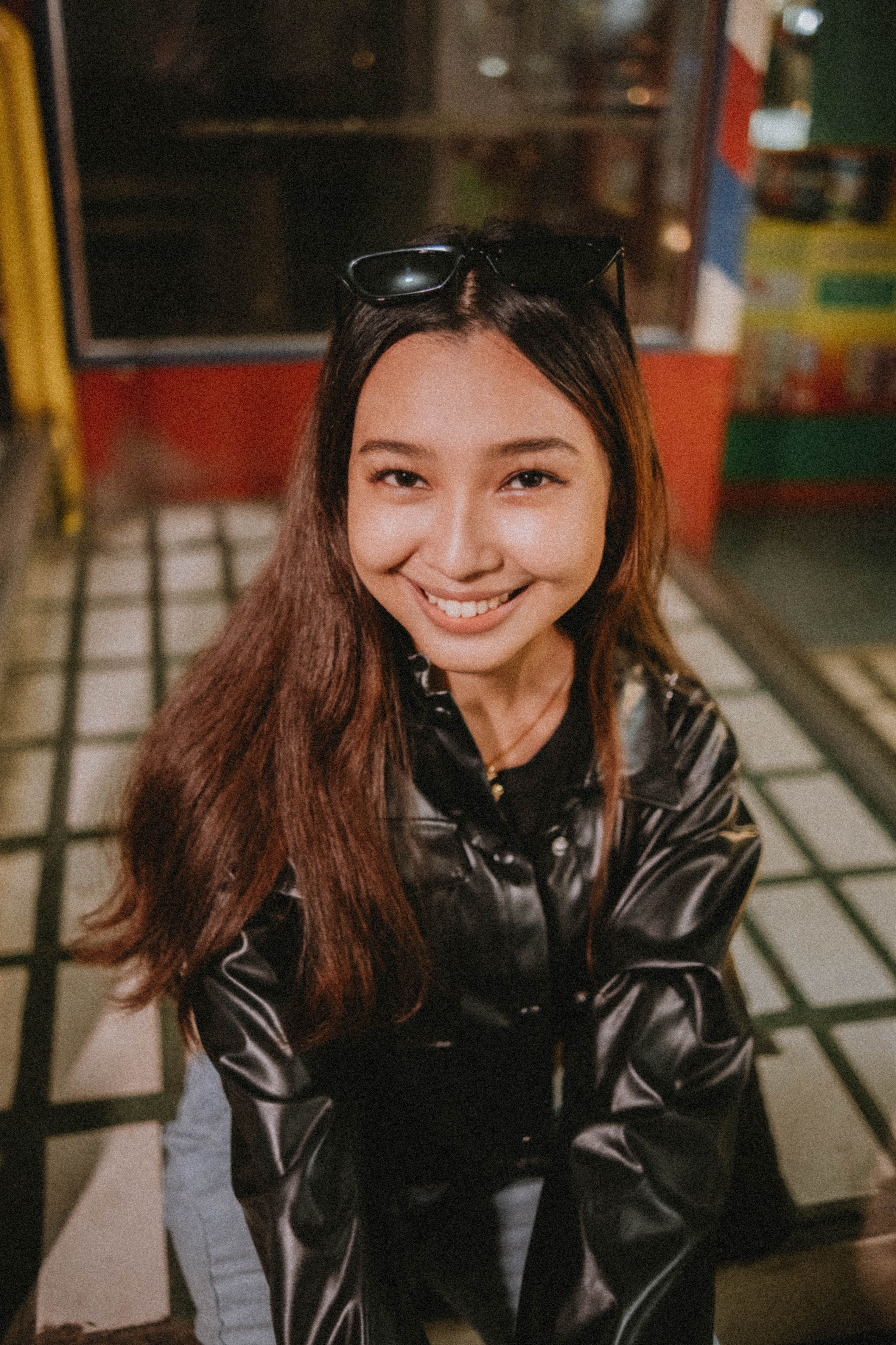 A Woman in Black Leather Jacket Smiling · Free Stock Photo