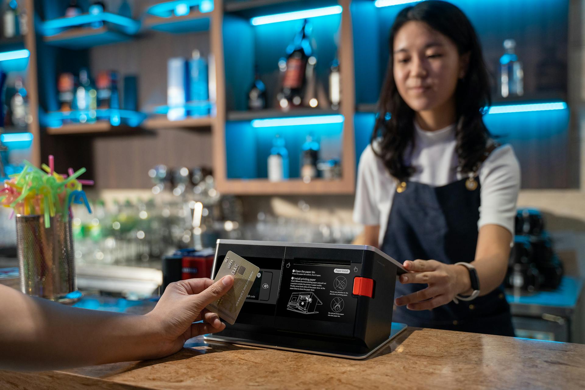 A Close-Up Shot of a Person Having a Card Payment