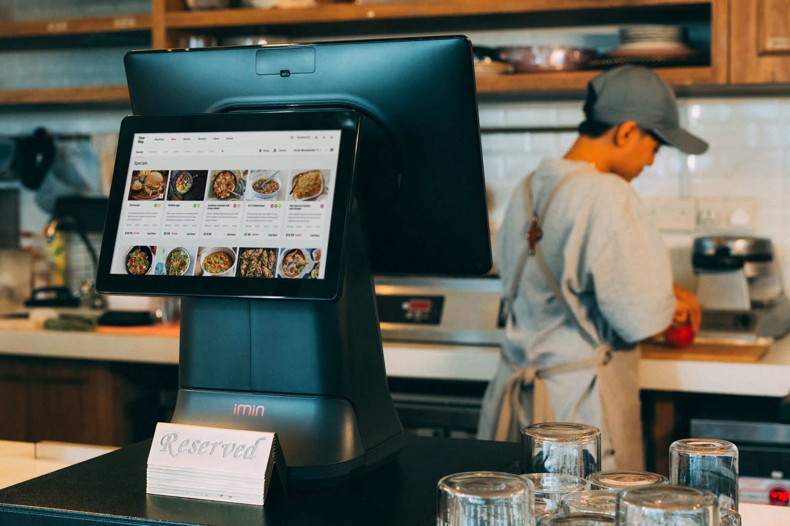 Restaurant POS tablet on a service counter during service