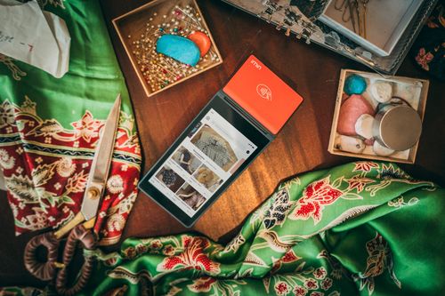 Free Flat lay of fabrics, sewing tools, and digital tablet showcasing a creative design workspace. Stock Photo
